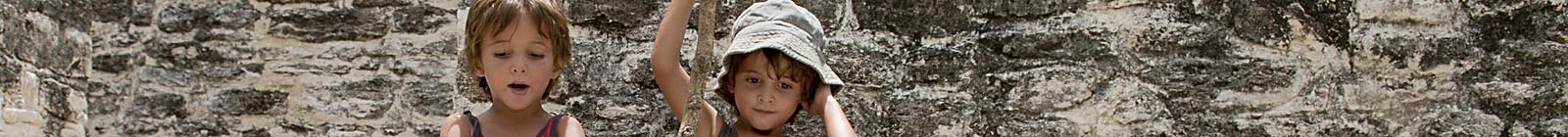 Boys in Xunantunich, Maya site in Belize - Banner