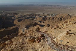 View onto desert and steps acsending to Saint Anthony cave.