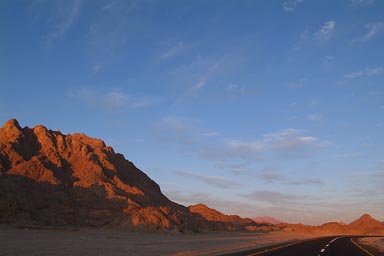 Road desert mountains in evening light. Egypt.