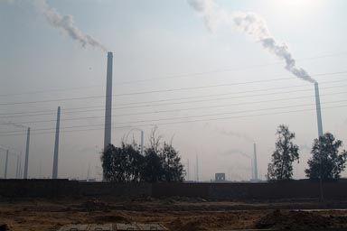 Cairo and smog, brick burning chimneys, southern exit.