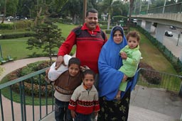 Happy Muslim tourist family in Cairo.
