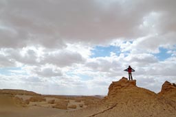 Christina on edge of Cliff, El-Hitan-Egypt.