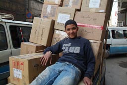 Boy on back of pick-up truck-Cairo.