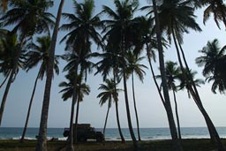 Ghana Land Rover and beach, sea in background