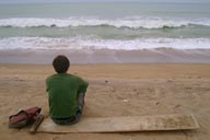 Me looking out on ocean on beach in Grand Popo, Benin.