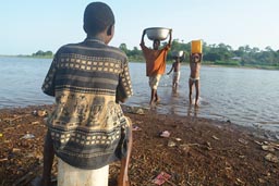 Children on lake Volta, Ghana fetch water