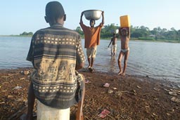 Carrying water in Africa, kids