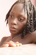 Bored girl around our house, Arquipelago dos Bijagos. Islands. Guinea Bissau.