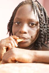 Bored girl around our house, Arquipelago dos Bijagos. Islands. Guinea Bissau.