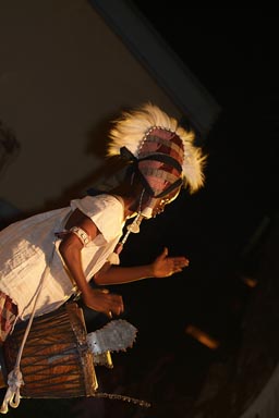 Kid djembe drummer.