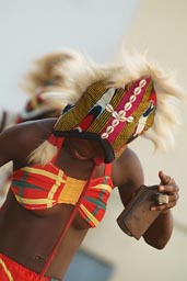 African dancing girl with bell, Percussion Competition Conakry.