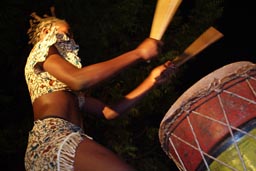 Dundun drumming girl.