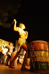 Doundoun drumming girl.