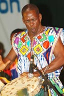 Mamady Keita, or Mamadie, djembefola, or djembefolla, djembe percussion ballet made in Guinea. His groups name is Sewakan, Djembe d'or Festival, Conakry Guinea, Guinee.