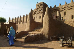 Djenne mosque and woman.