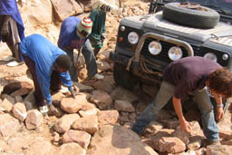 Road building lot of helping hands.