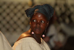 Girl dancer turnes around her head.