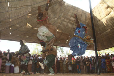Dance with high jumps, action inside the tent.