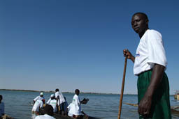 Crew on a pirogue.