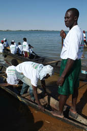 Crew on a pirogue.