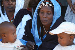 Tinde woman with 2 boys.