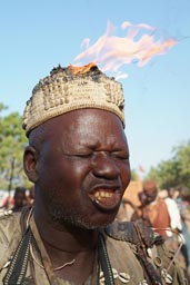 Festival sur le Niger, Segou, 2008, Mali, Donsow, hunter, burning head/hat.