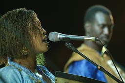 Amy Sacko, Bassekou Kouyate blurred.