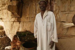 Elder Dogon shows me water source in Dogon escarpement.