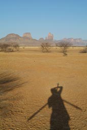 Shadow of me in front of Hand of Fatima, Mali, taking pictures.