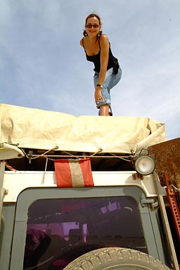 Hasna on top of Land Rover