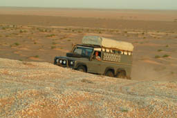 Land Rover on dune of mussels