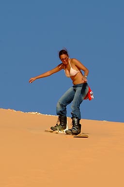 First try on snowboard in the dunes