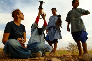 Hasna and boys and baby goats