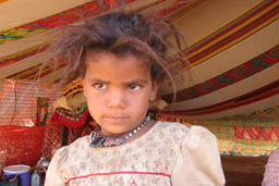 Bedouin mother and girl in tent