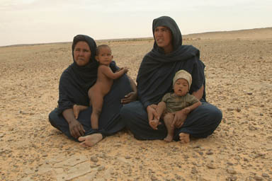 Bedouins, women and children.