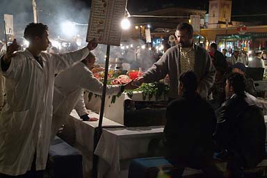 Come sit down here, Jemaa- El Fna restaurant