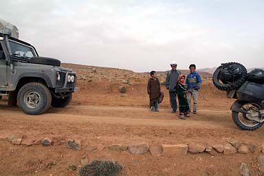 Children blocking the road and demanding bon-bons