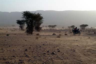 Visibility detiriorates: Sand and the desert and Mike on his bike