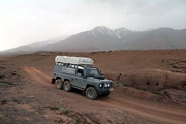 Land Rover road to Agouim, snow covered High Atlas peaks in the back