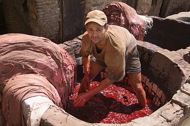 Man in red dye