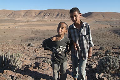 Brother and cousin Ahmed, the camp is in the valley below, just behind the two boys.
