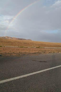 Rainbow and Street, mountains in back