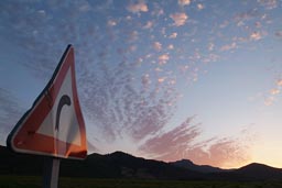 Sardegna/Sardinia clouds evening sky, red sky clouds. roadsign, reflections.