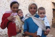 Girls and the boys carried with cloth the traditional Moroccan way.