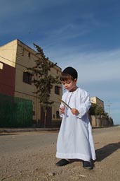 Child in white jellaba.