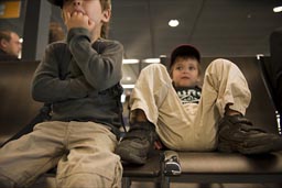 6 a.m. Vienna airport at gate, the boys have not really woken up yet.