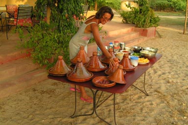 Hasna, preparing Tagine for evryone.