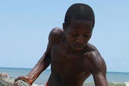 Fishermen pull their net in on Lumley beach, Freetown.