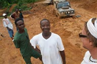 Dirt Road, Land Rover and truck stuck, African people, driver, talk.