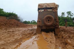 Rainy season, Land Rover stuck.